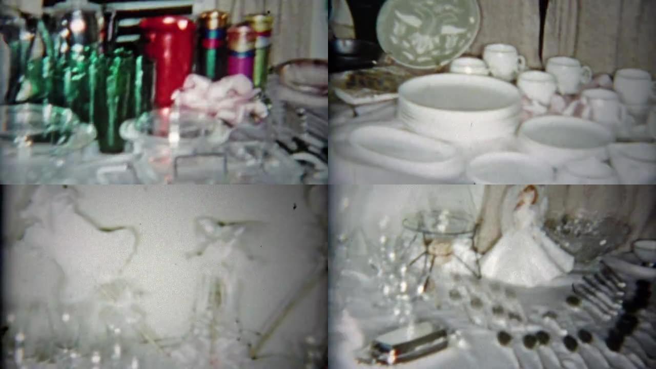 1964: 婚礼礼物摆放在厨房和家庭用品的桌子上。