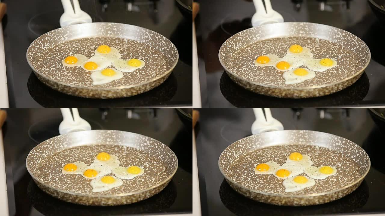 在平底锅上煎鹌鹑蛋