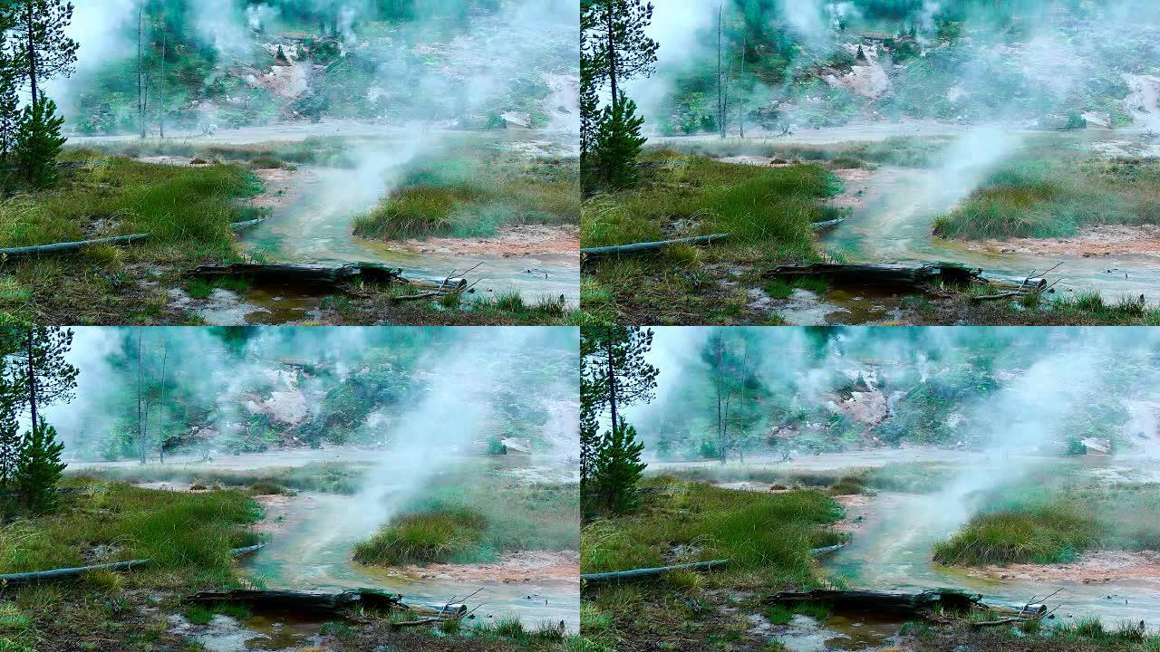 无缝环路-美国怀俄明州黄石国家公园雨中的地热温泉。多色水池中显示的雨滴。