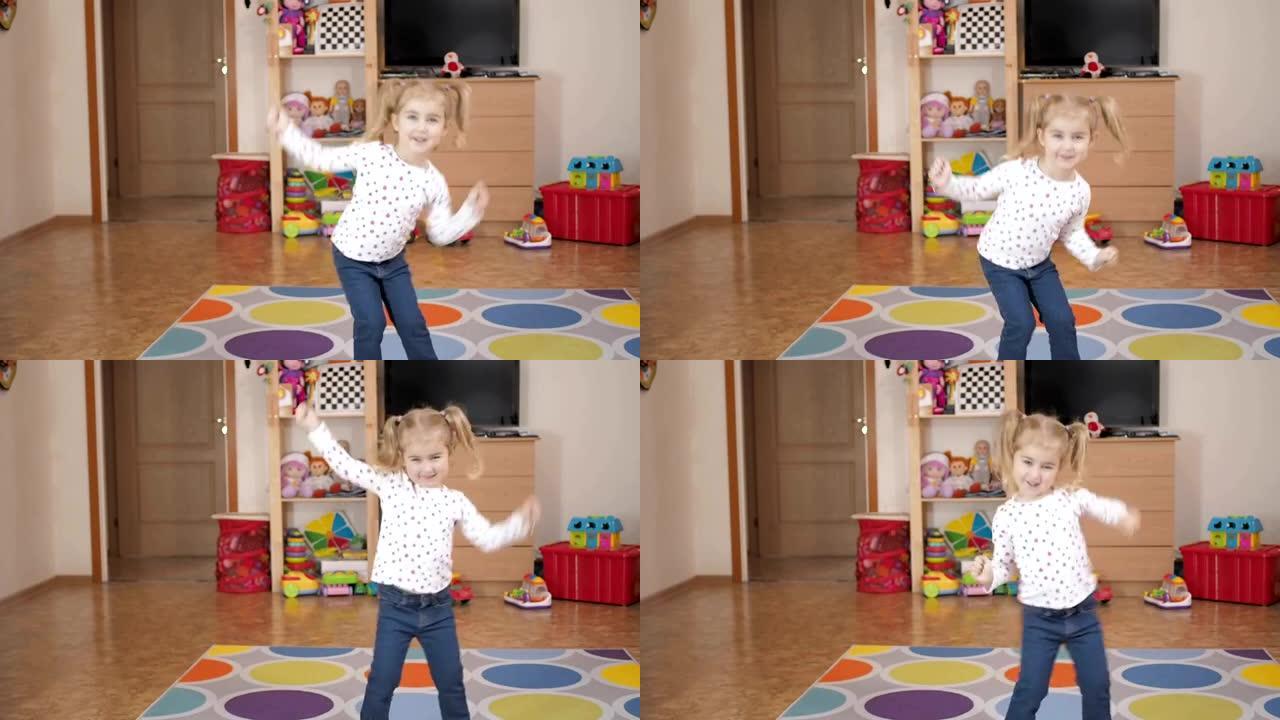 快乐的金发小女孩在家里或幼儿园的阳光房间里跳舞很开心