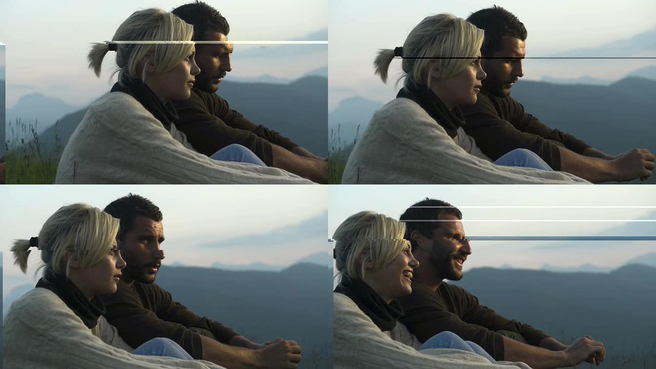 日落时年轻坐着的夫妇什么全景山视频高清