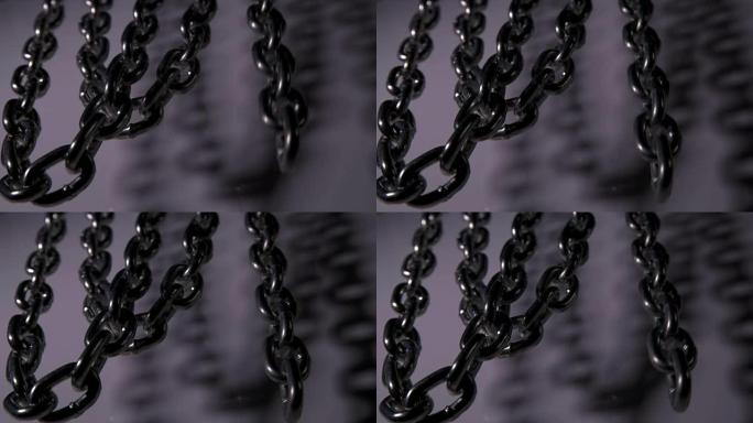许多链条悬挂和摆动