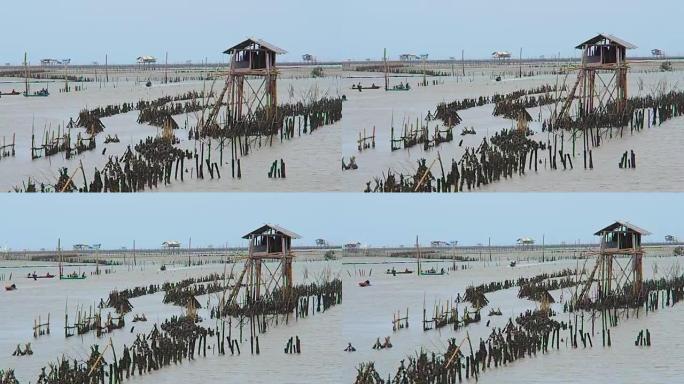 缩小: 泰国碧翠府水中的渔民竹屋