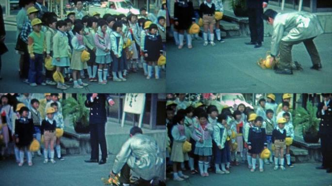 1972: 日本学校男生校服学习安全知识。