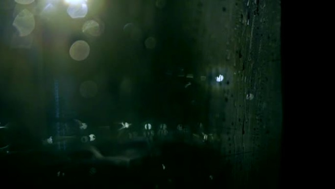 暴风雨之夜，窗外闪电慢动作bokeh视频