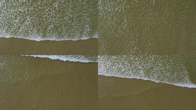 海浪到达岸上的头顶无人机镜头