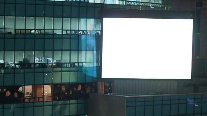 晚上办公楼闪烁空白屏幕的延时。韩国首尔