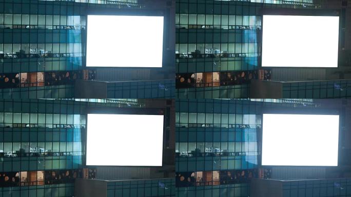 晚上办公楼闪烁空白屏幕的延时。韩国首尔