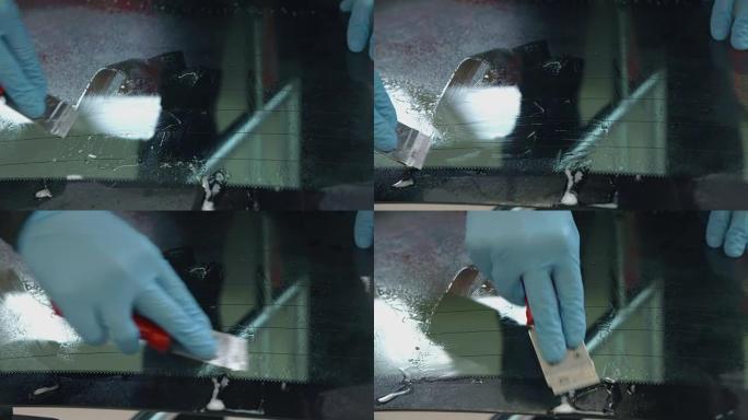 用刮刀清洁车窗安全开裂玻璃