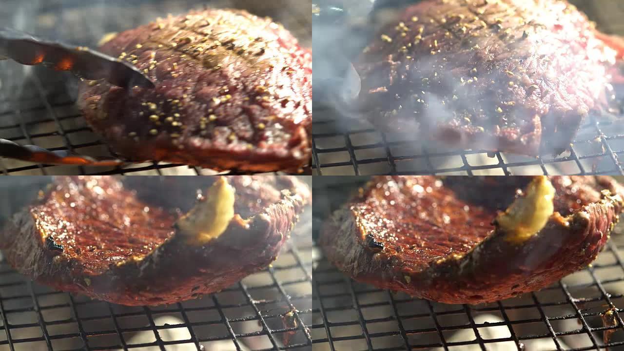 在火烧的烤架上烹饪美味的肉排