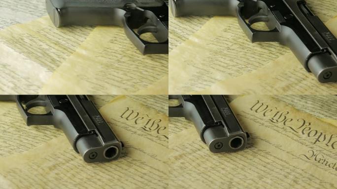 在美国宪法上躺着手枪的平移镜头