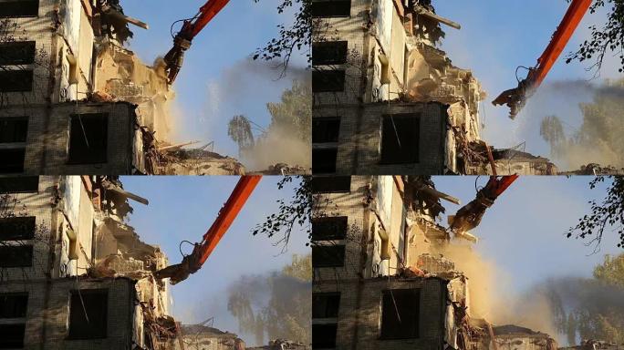 液压破碎机挖掘机机械正在拆除老房子