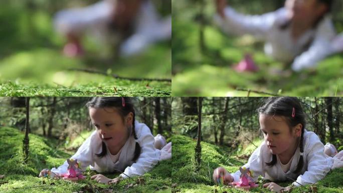 小女孩在树林里玩耍