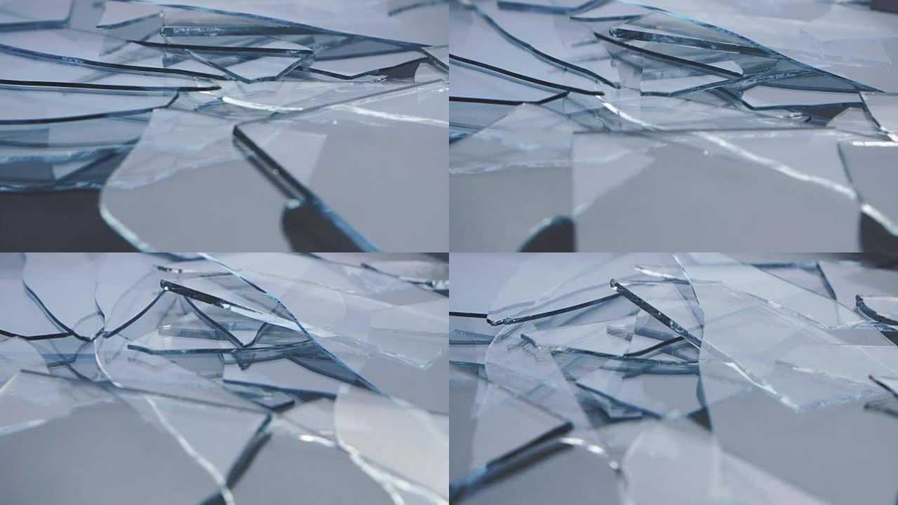 玻璃碎片躺在桌子上。特写