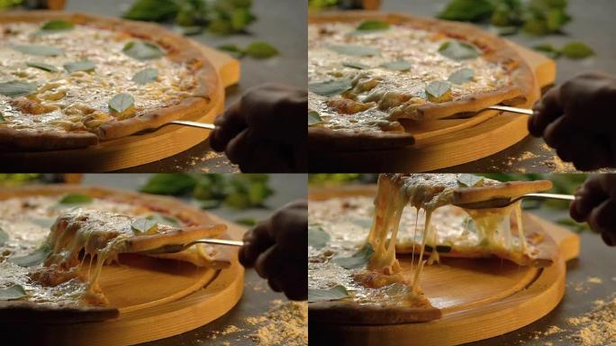 至尊美味披萨提起切片，融化奶酪和罗勒叶放在木制切菜板上，慢动作。