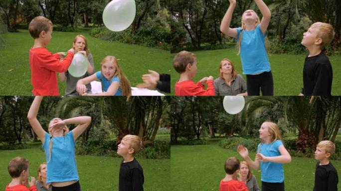 几个小孩开始和家人一起打气球-slowmo