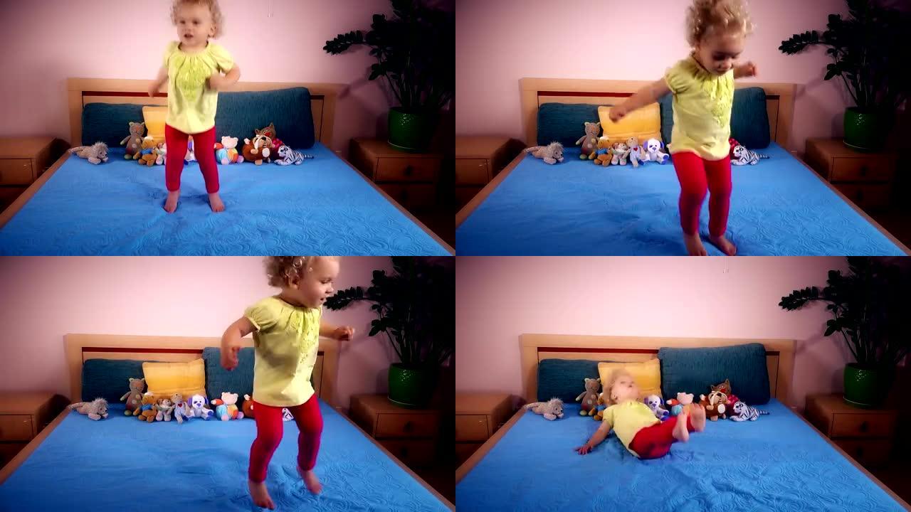 顽皮的蹒跚学步的女孩在卧室里跳跃和摔倒
