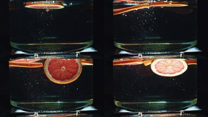 4k玻璃在水中滴葡萄柚