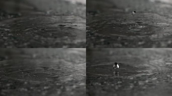 水滴撞击湿玻璃表面的超慢动作镜头