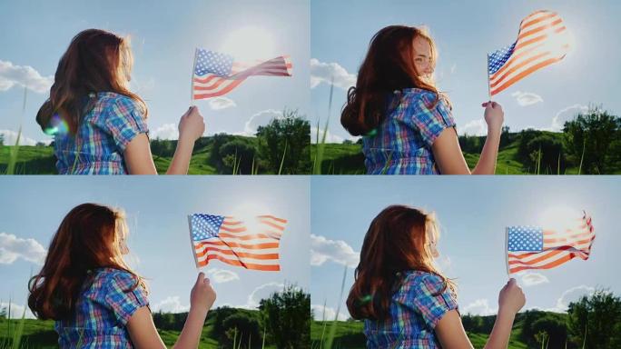 在阳光下悬挂美国国旗的年轻女子
