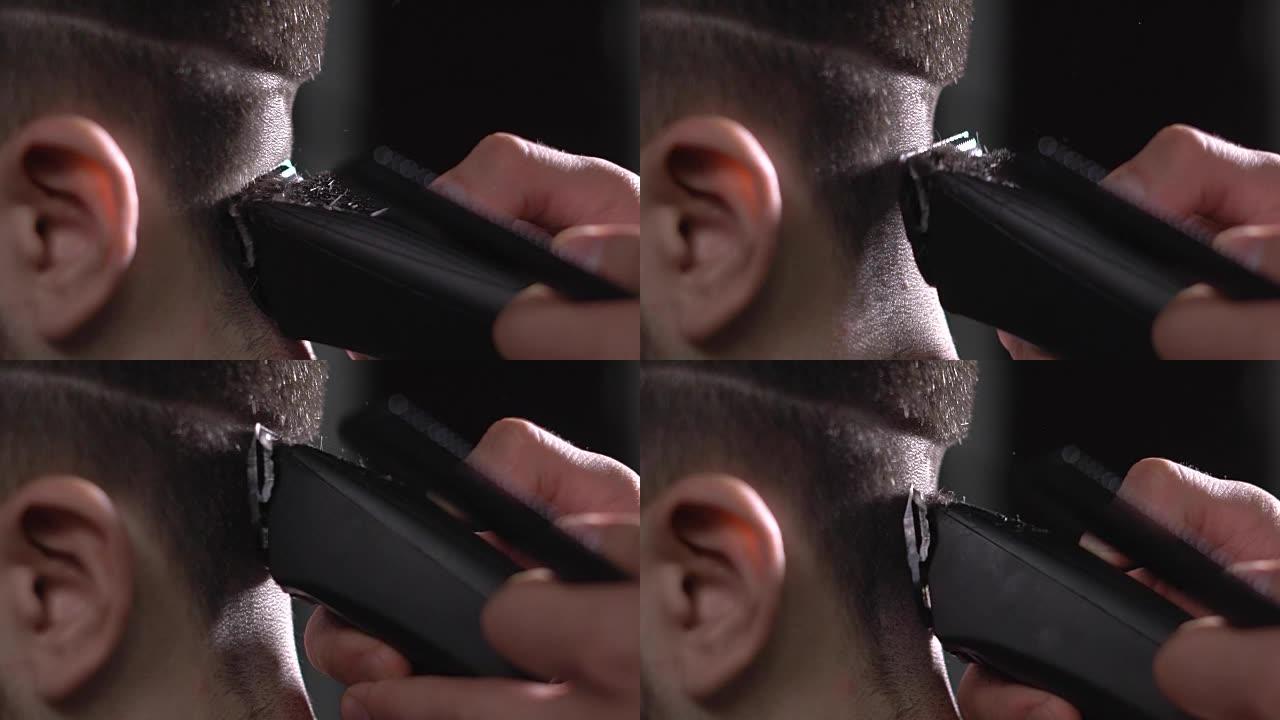 从男人身上剪头发的过程的特写镜头，剃须机轻轻地从客户的背部去除多余的头发