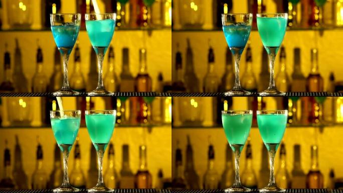 酒保将冰块放入玻璃杯中，倒入三种不同的酒精液体，绿松石，还有pinapple汁，使用gayser b