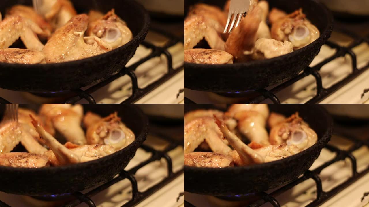 在锅中油炸的鸡肉特写视图
