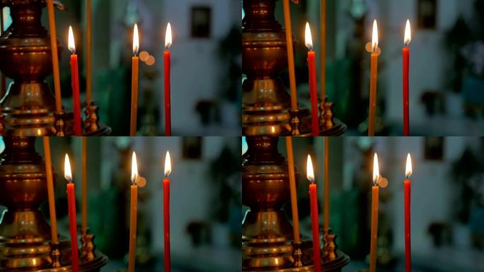 俄罗斯教会东正教圣礼中的黑蜡烛室内慢动作视频