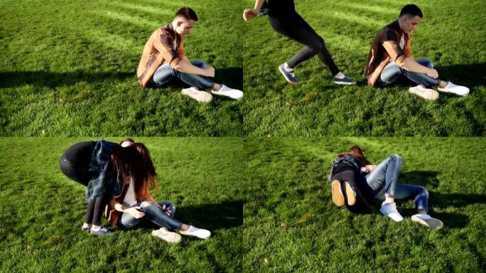 女友来的时候，男人坐在草地上使用智能手机