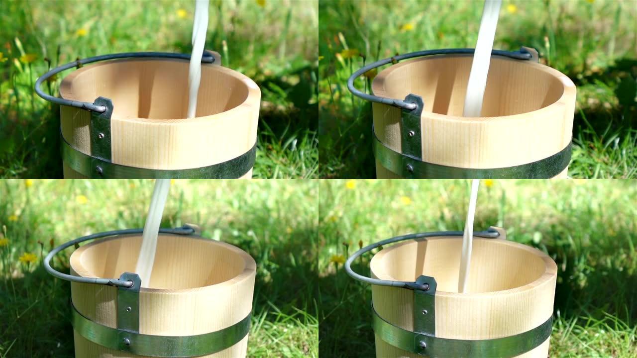 牛奶倒入木桶的两个视频-真正的慢动作