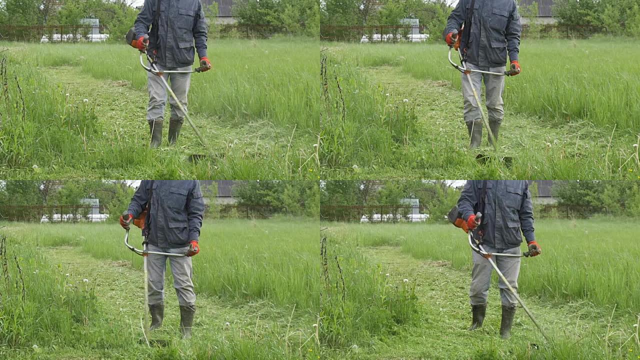 慢动作: 一个在花园里割草的人