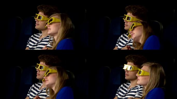 夫妇在电影院里用3D眼镜看电影。特写