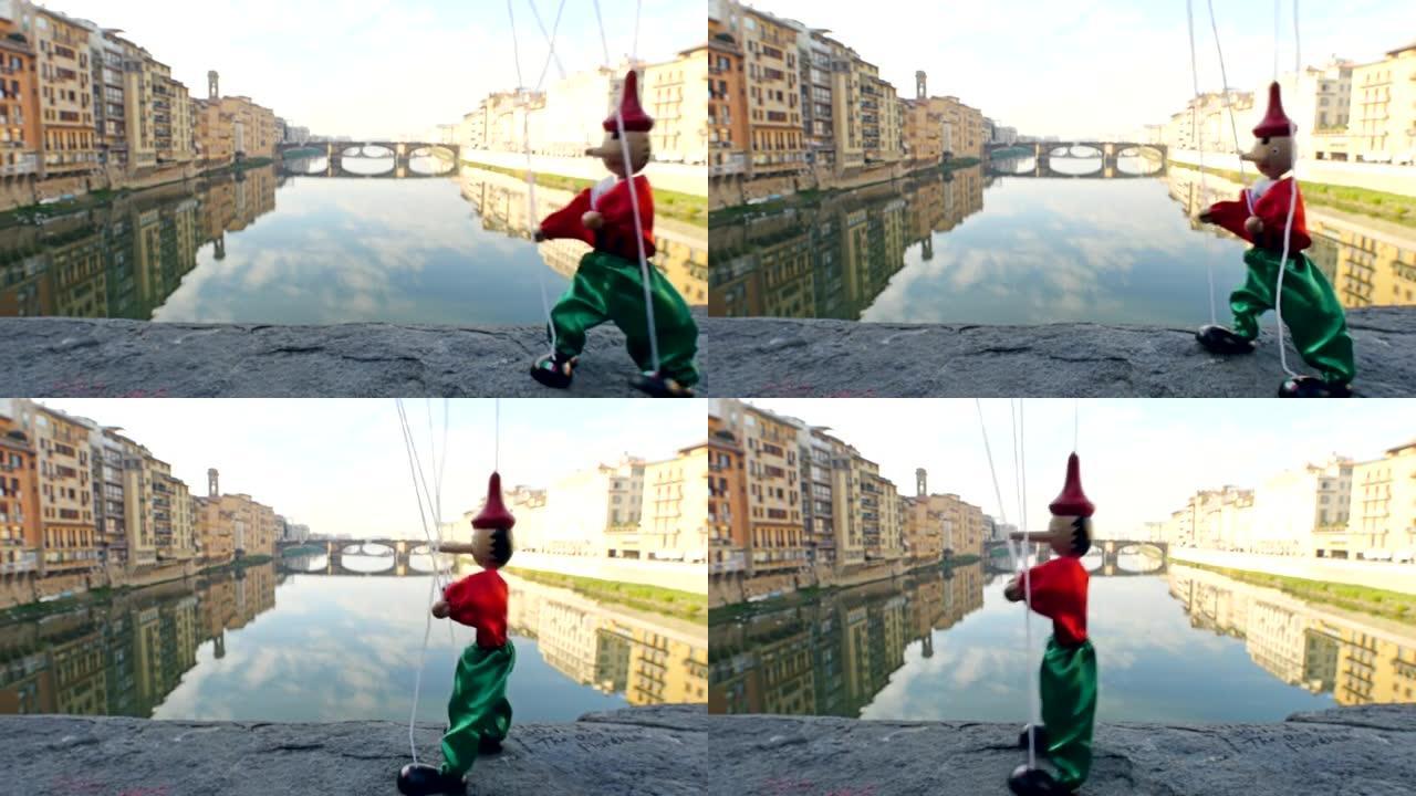 佛罗伦萨意大利木偶皮诺奇走在韦奇奥桥上