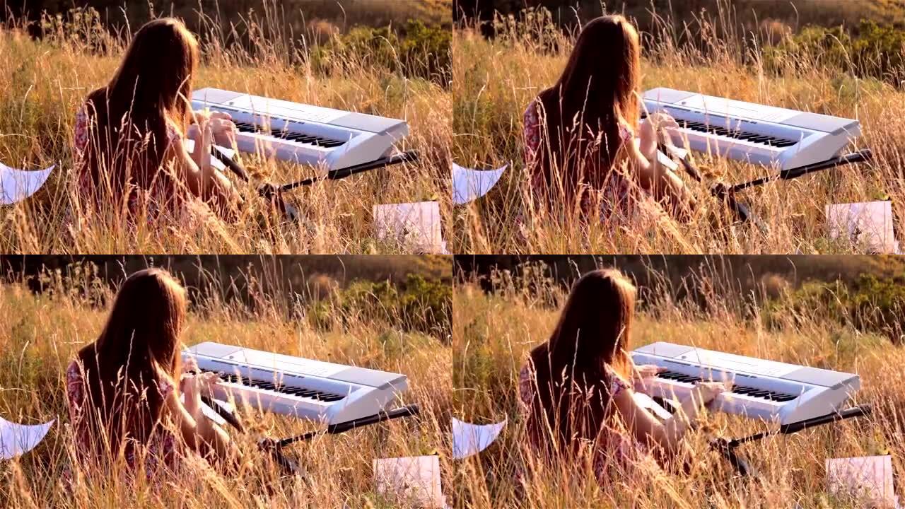 快乐的年轻女子在野外弹钢琴