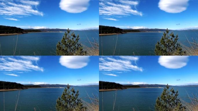 大湖蓝天白云顶上的雪顶山