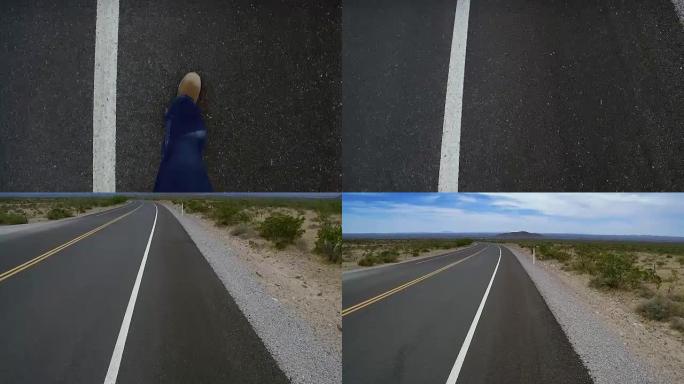 沙漠空旷的公路行走从脚向上看