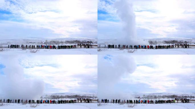 冰岛Strokkur间歇泉喷发的游客