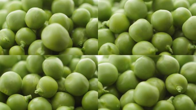 新鲜的绿豌豆旋转。特写