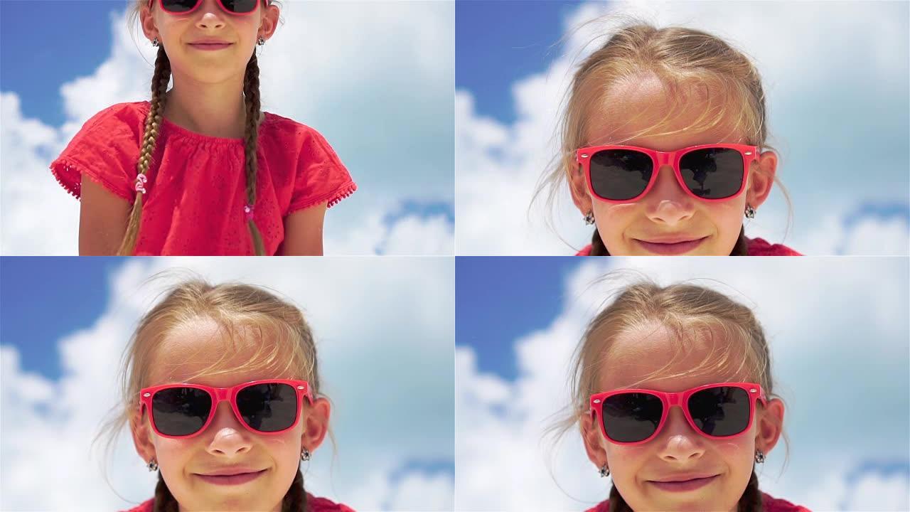 暑假期间海滩上可爱的小女孩的肖像。慢动作