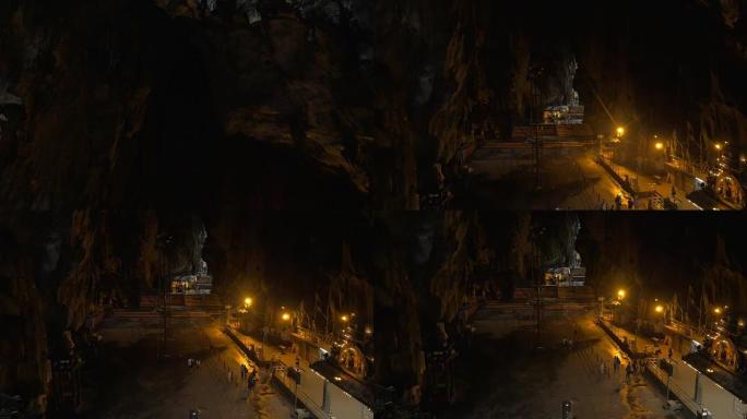 在马来西亚的黑风洞看到钟乳石和石笋，洞穴和寺庙的内部