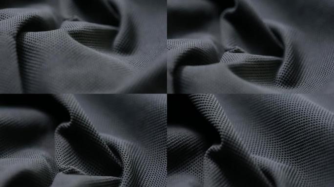网眼布。黑色合成织物。可以作为背景