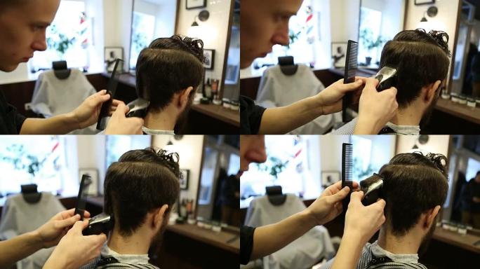 理发店用电动剃须刀理发。理发店或发廊的男士发型和理发。梳理胡须。工作场所的理发师