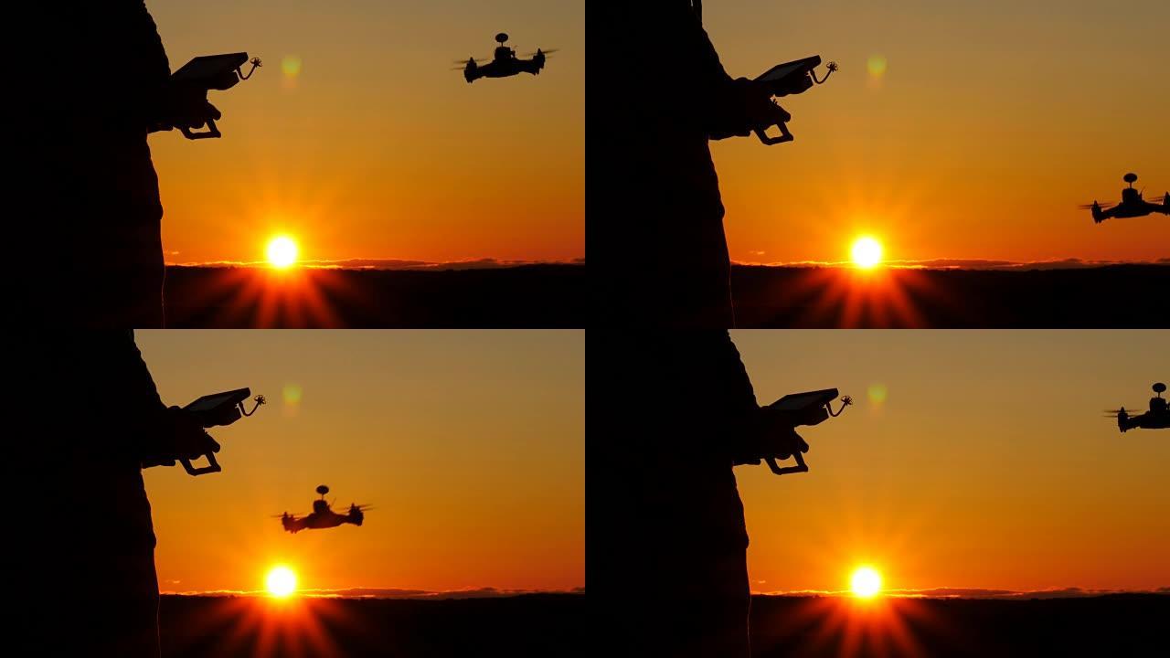 无人机赛车飞机在日落RC控制器处飞行和盘旋