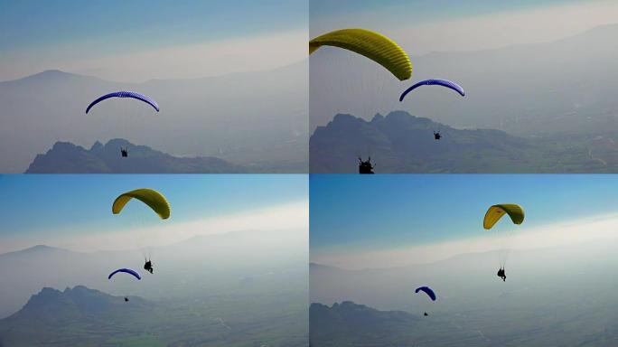 滑翔伞在滑翔伞极限运动比赛中飞越惊人的山脉