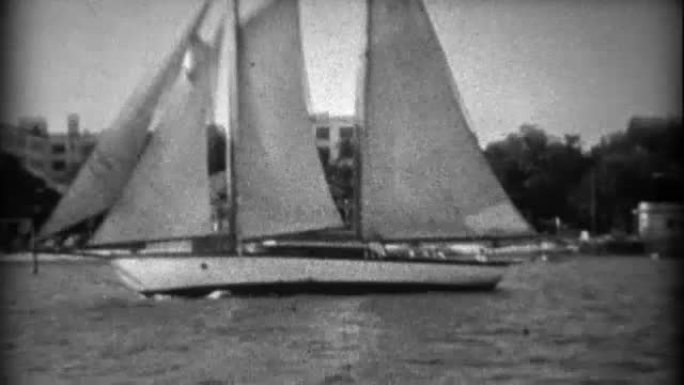 1934: 大型3帆船纵帆船横跨码头活动中心和山坡大厦。