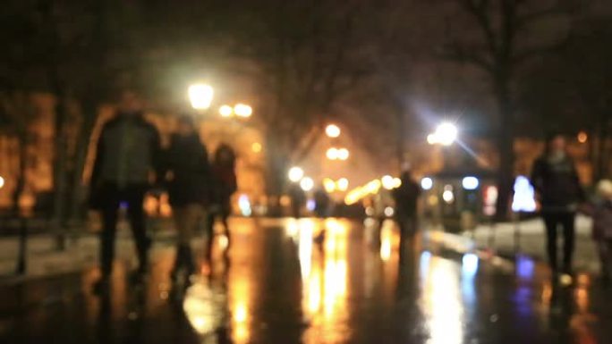人们在冬天的夜晚大街上，波兰克拉科夫