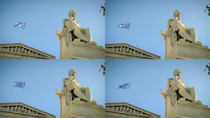 希腊哲学家苏格拉底雕像希腊国旗背景