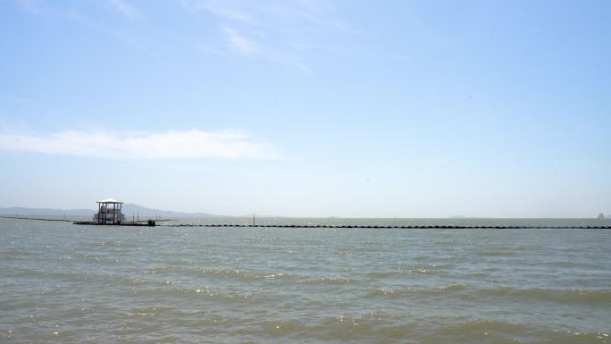 海天一线湖泊海天生态大风海风