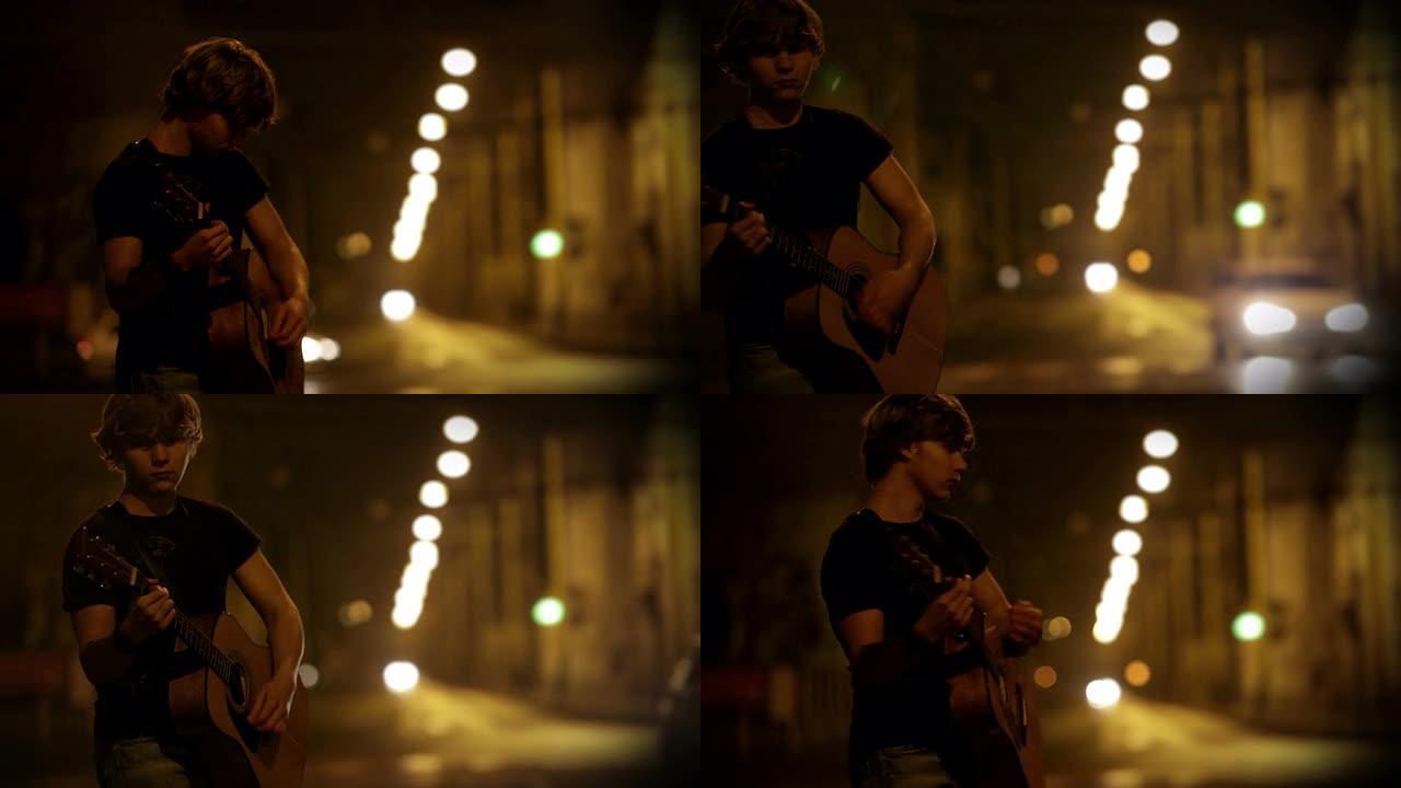 左撇子青少年吉他手在夜街上玩耍，看到汽车经过
