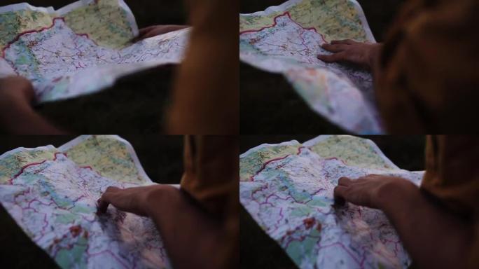 旅行者正在地图上寻找目的地